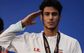 قهرمان MMA آسیا به یاد سرداران شهید سلام نظامی داد +فیلم