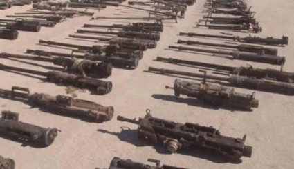 کشف سلاح های اسراییلی در مخفیگاه های داعش در المیادین+عکس