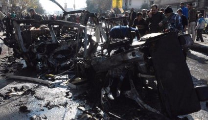 الصور الاولى لتفجير حافلة الركاب في حي عكرمة بحمص