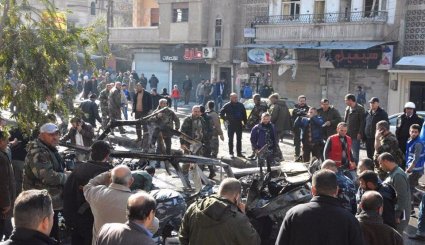 الصور الاولى لتفجير حافلة الركاب في حي عكرمة بحمص
