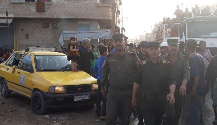 پرچم سوریه در شهرک الضمیر در غوطه شرقی به اهتزاز درآمد