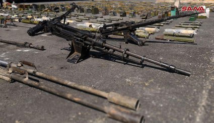 بالصور..كميات كبيرة من أسلحة الإرهابيين في ريف درعا