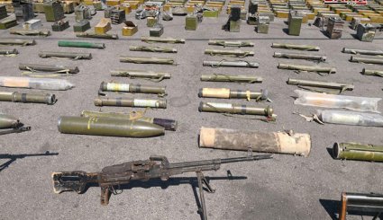 بالصور..كميات كبيرة من أسلحة الإرهابيين في ريف درعا