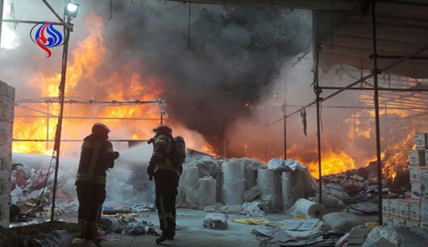 آتش سوزی گسترده درمحدوده میدان بهارستان