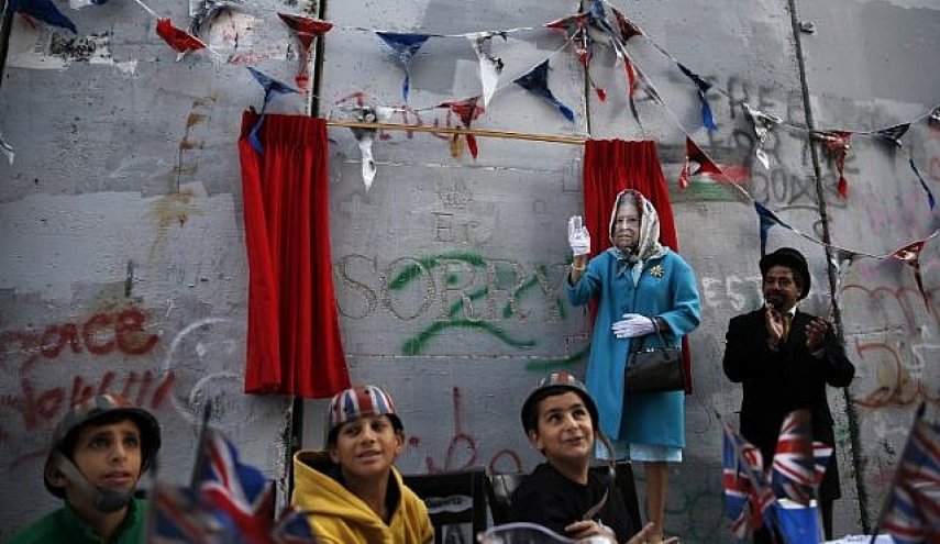UK artist Banksy holds ‘apology party’ in West Bank on Balfour Declaration anniversary
