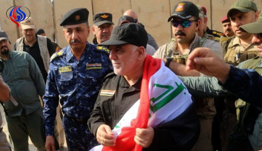ماذا قال العبادي أثناء رفع العلم العراقي في القائم؟ 