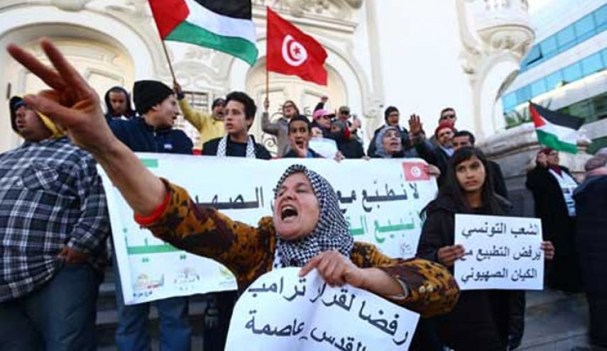 تونس: وقفة احتجاجية تطالب بسن قانون يجرم 