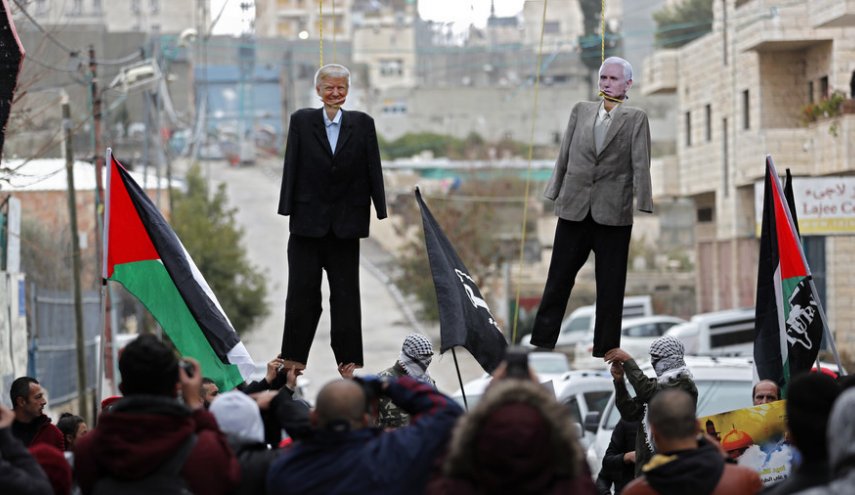 Trump & Pence effigies burned in Palestinian mock execution 
