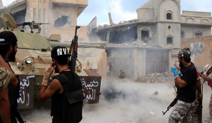 ارتفاع عدد ضحايا الاشتباكات في طرابلس إلى 13 قتيل و52 جريح 
