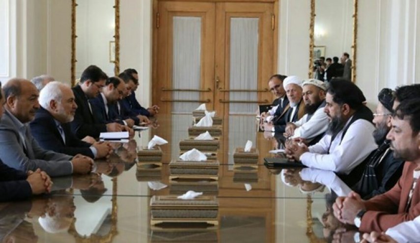 رئيس مجلس الشيوخ الافغاني يبحث مع ظريف توطيد العلاقات مع ايران
