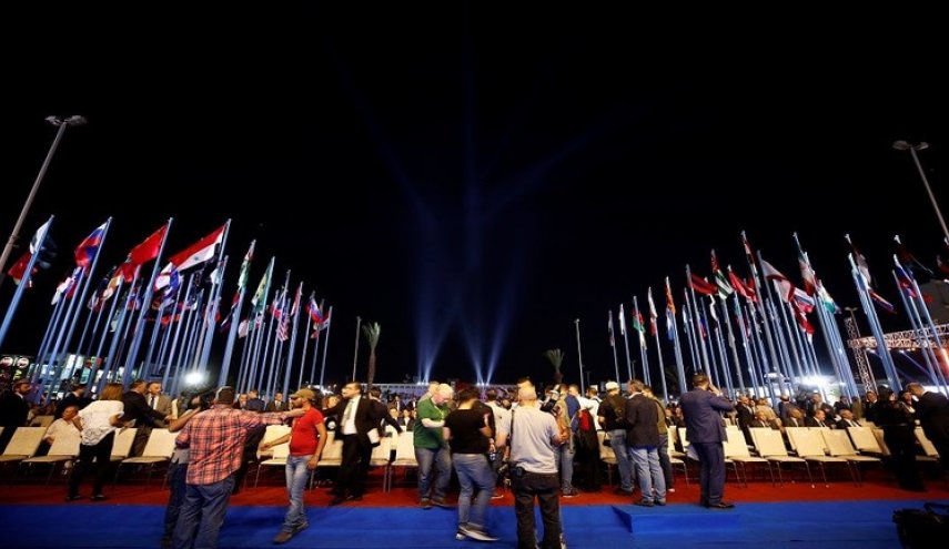 38 دولة ترفع أعلامها بمعرض دمشق الدولي رغم التهديد الامريكي
