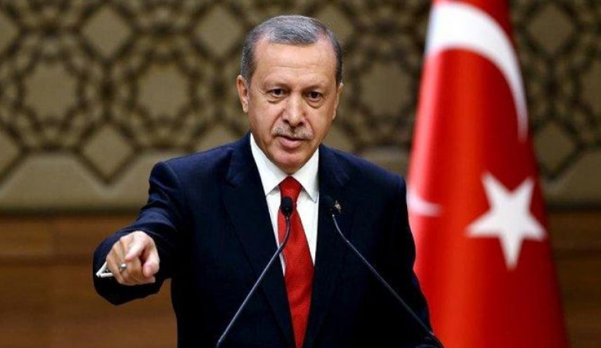 الاعلام التركي يوجه تهمة خطيرة للذين احرقوا صورة اردوغان