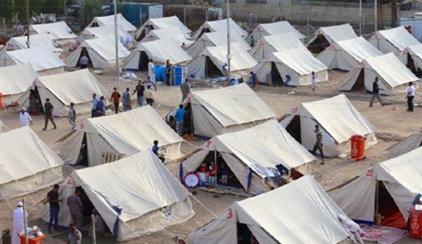 الهجرة العراقية تغلق مخيما للنازحين جنوبي الموصل