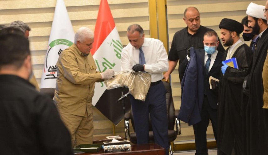وقتی نخست وزیر عراق لباس سازمانی الحشد الشعبی را پوشید + عکس