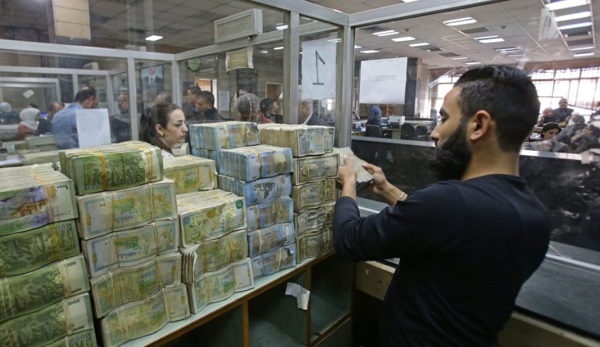 المركزي السوري يعلن تخفيضا جديدا في سعر الليرة مقابل الدولار