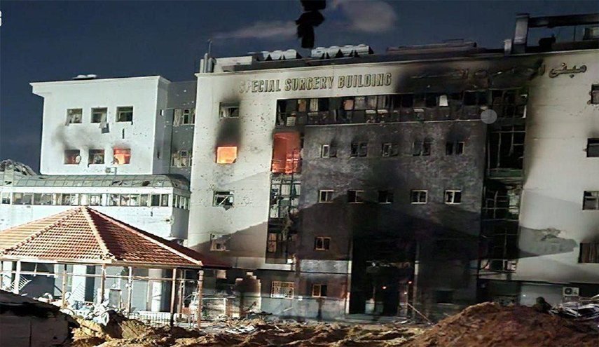 جنایات رژیم صهیونیستی در بیمارستان الشفا.. 400 شهید و 1050 منزل سوزانده شده