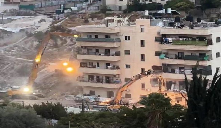 قوات الاحتلال تهدم بناية سكنية من 5 طوابق في 'الطور' بالقدس المحتلة