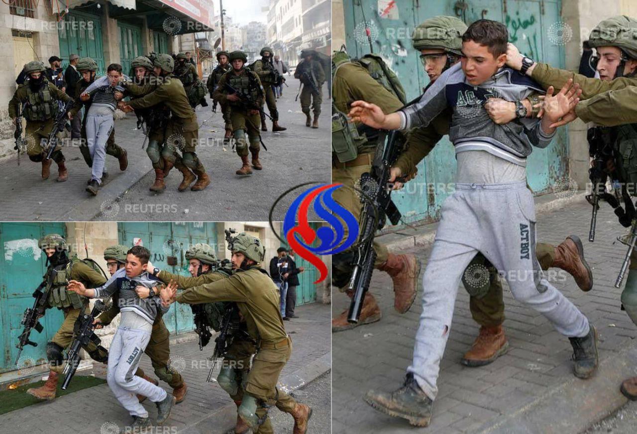 تصاویر بازداشت یک کودک فلسطینی توسط ارتش صهیونیستی در الخلیل