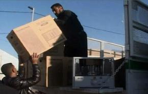 توزيع مساعدات مرجعية النجف على النازحين السوريين