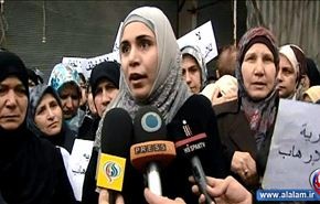 تظاهرة نسوية تنددة بخطف النساء والأطفال بسوريا