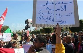 بالصور وفيديو...التونسيون يتظاهرون دعما لبشار الاسد