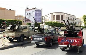 ليبيا:مسلحون يحاصرون وزارتين ويطالبون بإسقاط النظام