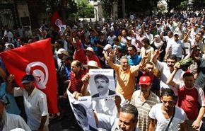 صدامات بين شرطة تونس ومتظاهرين عقب جنازة البراهمي