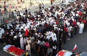 الاف البحرينيين يشاركون بتشييع جثمان الشهيد منصور