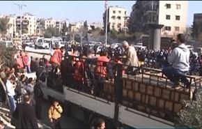 فيديو ايصال المساعدات لمخيم اليرموك رغم حصار المسلحين