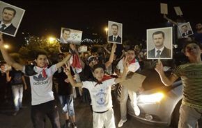 بالصور: احتفالات سوريا ابتهاجا لفوز الأسد بانتخابات الرئاسة