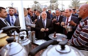 چای خوردن نخست وزیر عراق در خیابان + عکس
