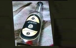 بالفيديو.. زجاجة كحول بشعار