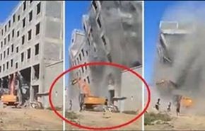 شاهد لحظة انهيار مبنى متعدد الطوابق على العمال