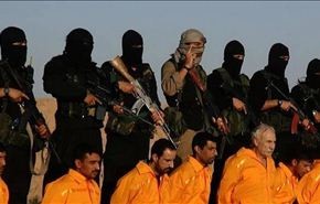 بالصور/داعش يعدم 11 عنصرا من الحشد الشعبي بالعراق