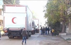 وصول المساعدات الإنسانية إلى حي الوعر بحمص بعد الاتفاق