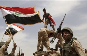 العلم العراقي يرفرف فوق مركز شرطة زخيخية في الانبار