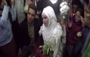 شاهد.. زفاف عروسين سوريين بمخيم للاجئين باليونان