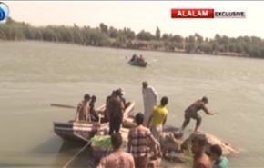 مئات العائلات تهرب من قبضة داعش في الفلوجة عبر نهر الفرات