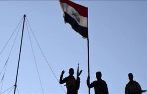 رفع علم العراق فوق المركز الصحي للجولان شمالي الفلوجة