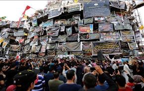 أصوات عراقية تطالب بتحويل مكان تفجير الكرادة الى مزار