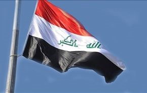 مجهولون يرفعون العلم العراقي وسط الموصل