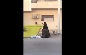 جستجوی زن سعودی به دنبال غذا در سطل آشغال! +ویدیو