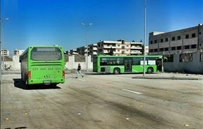 الحافلات الخضراء تخلي دفعة ثالثة من مسلحي حي الوعر بحمص