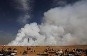 الموصل.. انبعاثات سامة وقوات أميركية ترتدي الأقنعة
