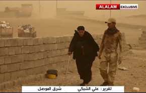 فيديو خاص: هكذا يتعامل الحشد مع العوائل النازحة في الموصل!!