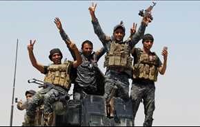 تحرير 6 أحياء في الموصل ورفع العلم العراقي فوق مبانيها