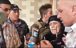 شاهد بالفيديو...امرأة عراقية تاريخية صمدت بوجه 