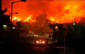 وصول الحرائق الى ضواحى تل أبيب وإغلاق مطار بن غوريون