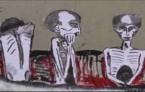 شاب يمني يرسم معاناة شعبه على الجدران