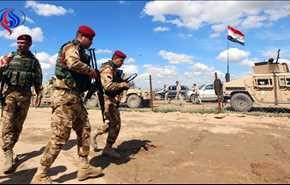 تحرير حي الموصل الجديدة ورفع العلم العراقي فوق مبانيه